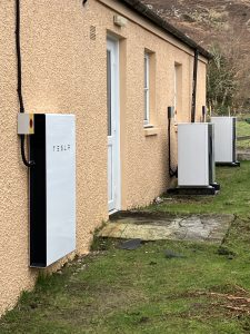 Storage battery and heat pumps installed outside Achmore Village Hall.